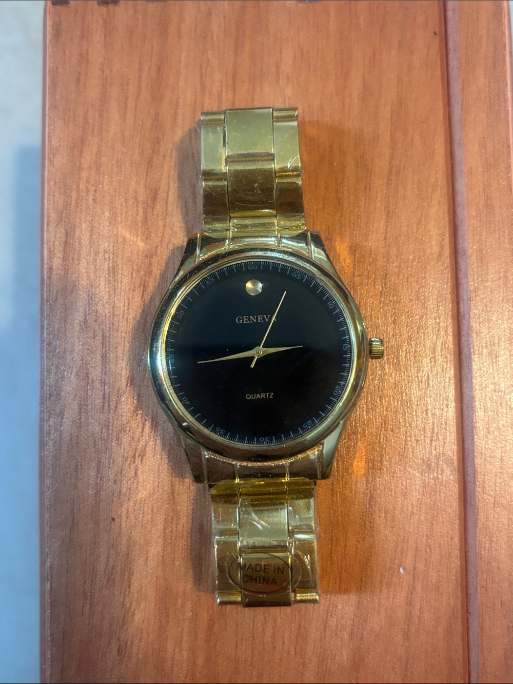 Geneva Gold Tone Watch with Black Dial